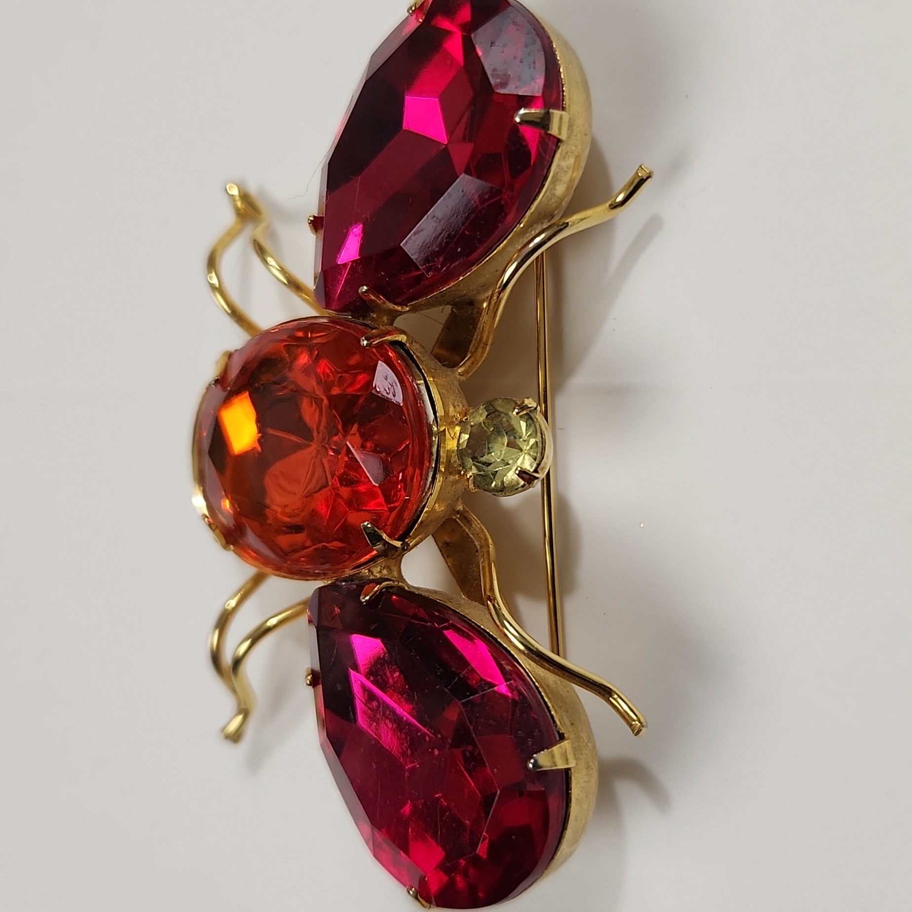 MidCentury GoldTone Flying Insect Brooch With Magenta Teardrop Wings